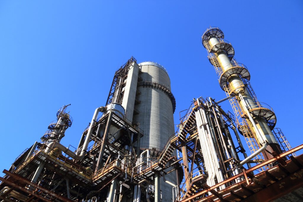 View of factory against blue sky